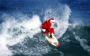 santa surfing good