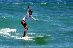 Jennifer Aniston surfing