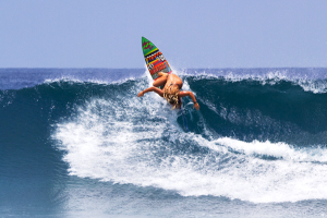 Felicity Palmateer surfing
