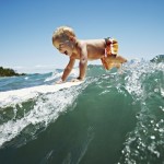 young kid surfing